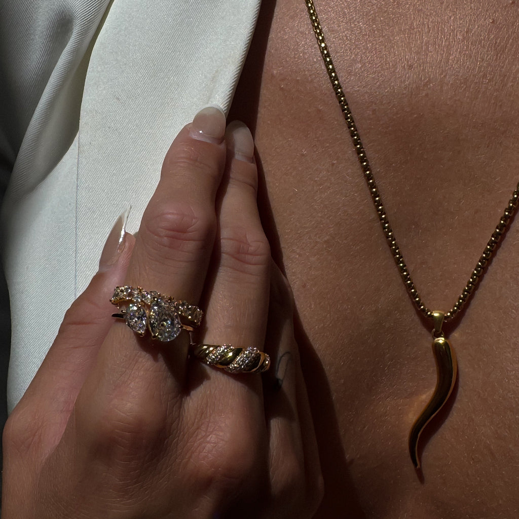 Kira Stone Ring – 18k gold plated twisted rope band with pavé-set stones, modern statement ring.