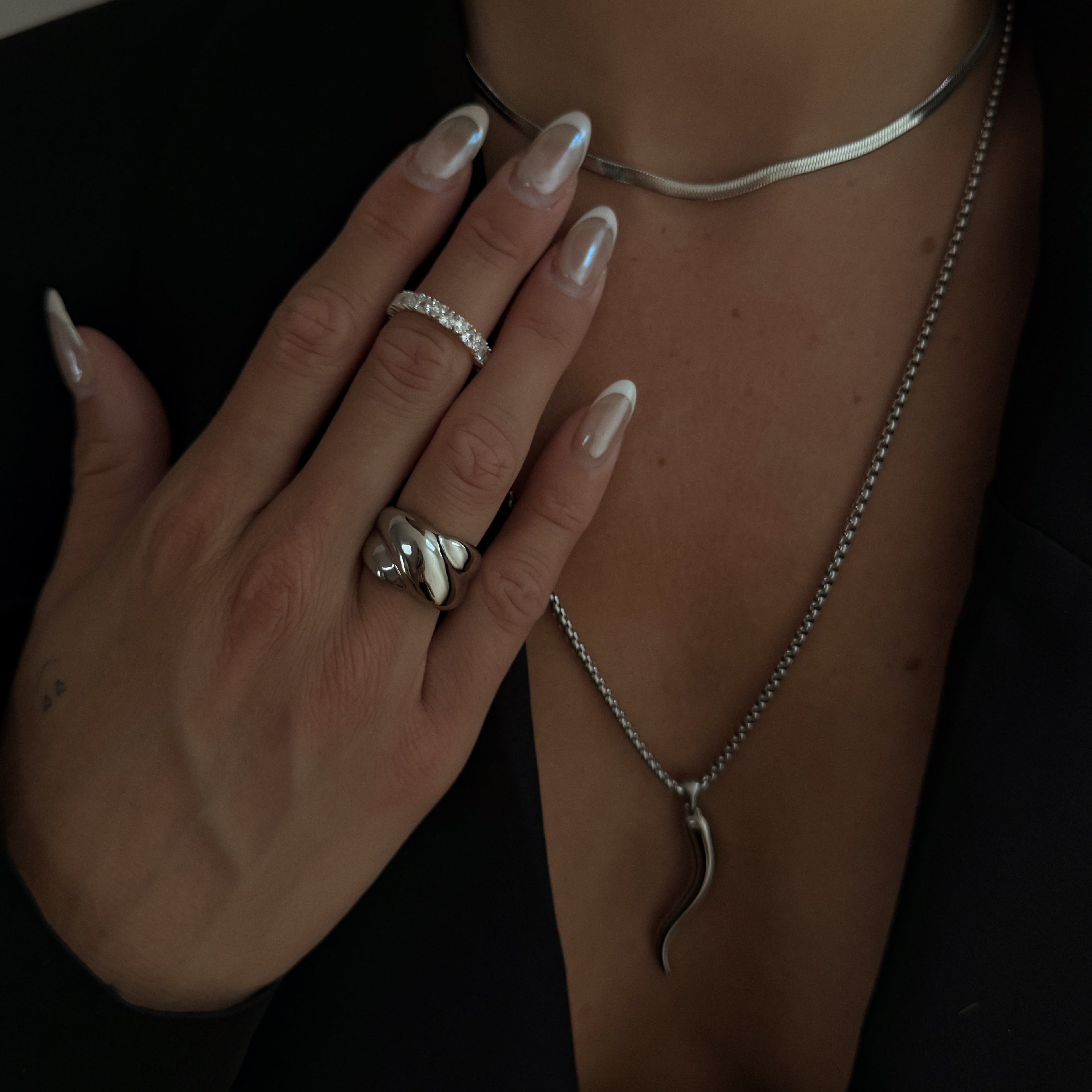 Romantic eternity ring in polished sterling silver with subtle hearts - Zaya Collective