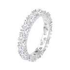 Romantic eternity ring in polished sterling silver with subtle hearts - Zaya Collective