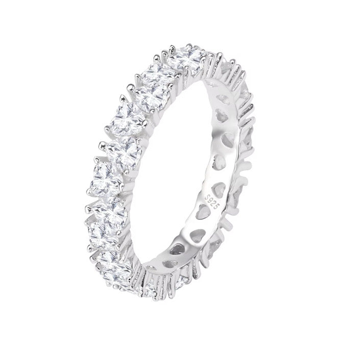Romantic eternity ring in polished sterling silver with subtle hearts - Zaya Collective