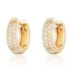 Mika Mini Huggie Earrings – 925 sterling silver with 18k gold plating and pavé detailing, small hoop earrings for everyday wear.