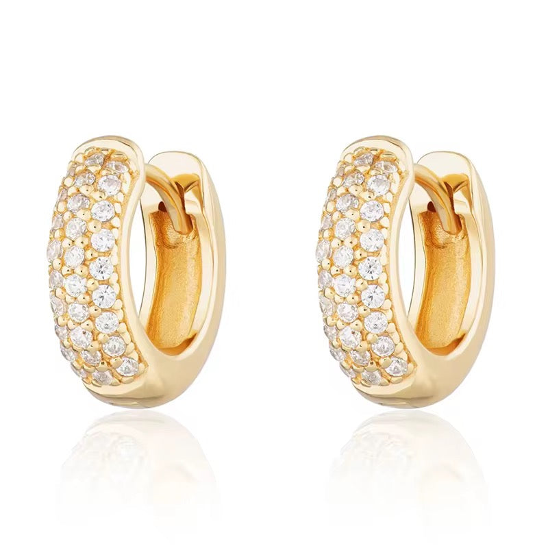 Mika Mini Huggie Earrings – 925 sterling silver with 18k gold plating and pavé detailing, small hoop earrings for everyday wear.